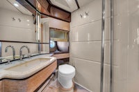 a bathroom with a toilet and sink