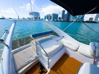 the back of a boat with a view of a city