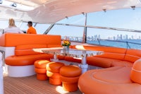 orange couches on a boat