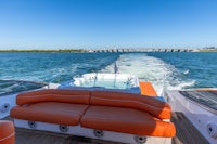 a boat with a hot tub on the back deck
